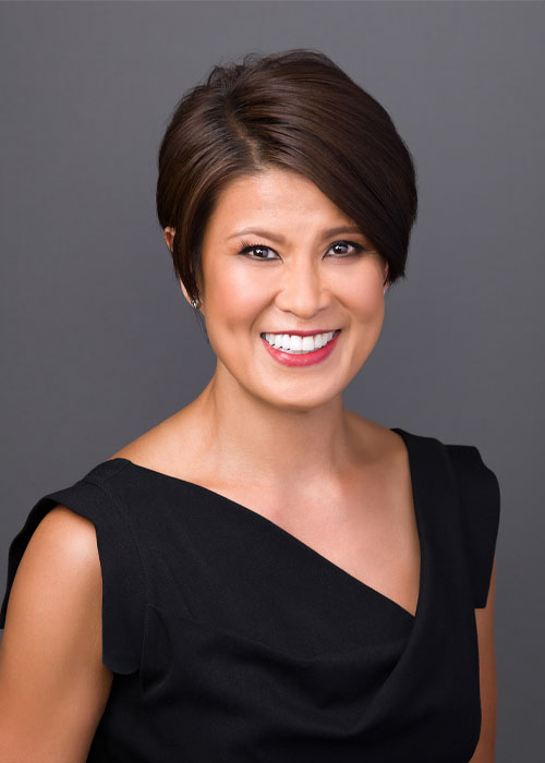 Headshot of Geraldine Tomich